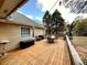 Open-air back deck with a dining set perfect for outdoor gatherings and relaxation at 2515 Little John Ct, Cumming, GA 30040