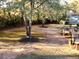 Large private backyard shows a serene landscape with mature trees and access to an expansive wooden deck at 2515 Little John Ct, Cumming, GA 30040