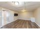 Finished basement boasts new laminate flooring, recessed lighting, and a television for entertainment at 2515 Little John Ct, Cumming, GA 30040