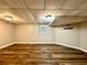 Spacious finished basement featuring durable floors, and recessed lighting at 2515 Little John Ct, Cumming, GA 30040