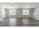 Large basement with natural light, and wood-look flooring is perfect for a recreation area at 2515 Little John Ct, Cumming, GA 30040