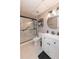 Basement bathroom with updated vanity, framed mirror, and tiled shower with sliding glass door at 2515 Little John Ct, Cumming, GA 30040