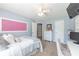 Bright bedroom with a fun, creative touch, featuring a message board and comfortable furnishings at 2515 Little John Ct, Cumming, GA 30040