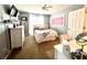 Comfortable bedroom featuring a bed, desk, neutral walls, and ample storage with its closet at 2515 Little John Ct, Cumming, GA 30040