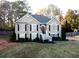 Beautiful two-story house with a gabled roof, manicured lawn, and well-kept landscaping at 2515 Little John Ct, Cumming, GA 30040