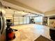 Large garage with storage shelves and space for multiple vehicles or a workshop at 2515 Little John Ct, Cumming, GA 30040