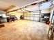Oversized garage with storage shelving and access to the house; perfect for projects and storage at 2515 Little John Ct, Cumming, GA 30040