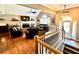 Spacious living room with hardwood floors, vaulted ceilings, and a cozy fireplace at 2515 Little John Ct, Cumming, GA 30040