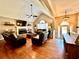 Inviting living room with fireplace, vaulted ceilings, hardwood floors, and open floor plan at 2515 Little John Ct, Cumming, GA 30040