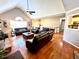 Spacious living room with vaulted ceilings, fireplace, and an abundance of natural light at 2515 Little John Ct, Cumming, GA 30040