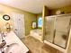 This main bathroom boasts double sinks, a tub, and a stand alone shower at 2515 Little John Ct, Cumming, GA 30040