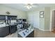 Office space with carpet floors, white closet doors, and a desk with shelving for storage and productivity at 2515 Little John Ct, Cumming, GA 30040