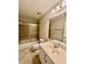 Bathroom with a bathtub/shower combination, single sink vanity, and tile flooring at 2822 Salem Oak Way, Duluth, GA 30096