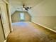 Large carpeted bedroom featuring a ceiling fan and bright natural light from the window at 2822 Salem Oak Way, Duluth, GA 30096