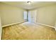 Cozy bedroom with wall-to-wall carpet and a double door closet, creating a comfortable and functional space at 2822 Salem Oak Way, Duluth, GA 30096