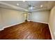 Bedroom features hardwood flooring, crown molding, ceiling fan, and natural light at 2822 Salem Oak Way, Duluth, GA 30096