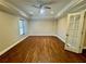 Bright and airy bedroom featuring hardwood flooring, recessed lighting and natural light at 2822 Salem Oak Way, Duluth, GA 30096