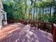 Inviting wooden deck offers plenty of space and overlooks a wooded backyard at 2822 Salem Oak Way, Duluth, GA 30096