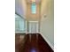 Grand foyer with high ceilings, hardwood floors, and a large window for natural light at 2822 Salem Oak Way, Duluth, GA 30096