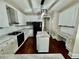 Modern kitchen featuring white cabinets, stainless steel appliances, and a center island, great for cooking at 2822 Salem Oak Way, Duluth, GA 30096