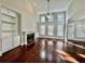 Bright living room with a fireplace, built-in shelves and high ceilings at 2822 Salem Oak Way, Duluth, GA 30096