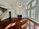 Cozy living room with fireplace, built-in shelving, and hardwood floors at 2822 Salem Oak Way, Duluth, GA 30096