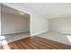 Spacious living room featuring plush carpeting and hardwood flooring in adjacent space at 5995 Crowley Dr, Douglasville, GA 30135