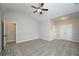 Spacious main bedroom featuring a ceiling fan, large closet, and vaulted ceiling at 5995 Crowley Dr, Douglasville, GA 30135