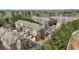 View of townhomes with lush landscaping, creating a serene living environment at 928 Boudreau Ct, Atlanta, GA 30328