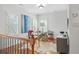 Bright home office with shuttered windows, desk, and hardwood flooring at 928 Boudreau Ct, Atlanta, GA 30328