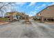 Gated community entrance featuring stone pillars, wrought iron gates, and secure access for residents at 1468 Briarwood Ne Rd # 502, Brookhaven, GA 30319