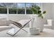 Close-up of a modern coffee table with decorative book, candle and plant in the living room at 1468 Briarwood Ne Rd # 502, Brookhaven, GA 30319