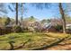 Expansive backyard featuring a lush lawn and inviting outdoor space, ideal for relaxing and entertaining at 218 Garland Ave, Decatur, GA 30030