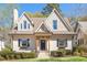 Charming home with a landscaped front yard, featuring black shutters and flower boxes, offering great curb appeal at 218 Garland Ave, Decatur, GA 30030