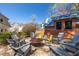 Cozy backyard fire pit area surrounded by chairs and lush greenery at 218 Garland Ave, Decatur, GA 30030