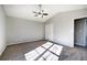 Bedroom featuring neutral carpet and a ceiling fan at 63 Colette Ct, Douglasville, GA 30134