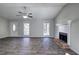 Spacious living room with a fireplace and lots of natural light at 63 Colette Ct, Douglasville, GA 30134