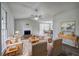 Bright and airy living room with hardwood floors, a fireplace, and lots of natural light at 63 Colette Ct, Douglasville, GA 30134