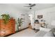 Bedroom with desk, hardwood floors, area rug, ceiling fan, and neutral colors at 1328 Briarwood Ne Dr, Atlanta, GA 30306