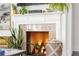 Elegant fireplace with a decorative mantle and a cozy ambiance at 1328 Briarwood Ne Dr, Atlanta, GA 30306