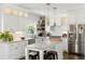 Well-appointed kitchen featuring white cabinets, stainless steel appliances, and marble countertops at 1328 Briarwood Ne Dr, Atlanta, GA 30306