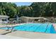 Community pool with diving board and ample seating at 3841 Admiral Dr, Atlanta, GA 30341