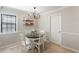 Charming dining area features neutral walls, white trim, decorative lighting, and a stylish table set at 3841 Admiral Dr, Atlanta, GA 30341