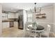 Well-appointed kitchen and dining area featuring stainless steel appliances and granite countertops at 3841 Admiral Dr, Atlanta, GA 30341