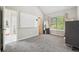 Bright bedroom with a neutral paint color and hardwood floors at 93 Carriage Lake Dr, Stockbridge, GA 30281