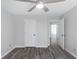 This is a well-lit room with a ceiling fan and modern vinyl floors at 3521 Kittery Dr, Snellville, GA 30039