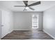 This is a well-lit room with a ceiling fan and modern vinyl floors at 3521 Kittery Dr, Snellville, GA 30039