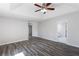 Spacious main bedroom features dark floors, tray ceiling, and en-suite bathroom at 3521 Kittery Dr, Snellville, GA 30039