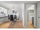 Bright dining area featuring a modern light fixture and stylish furnishings at 566 Trillum Sw Ct, Marietta, GA 30008