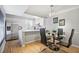 Bright kitchen and dining area, featuring stainless steel appliances and countertops at 566 Trillum Sw Ct, Marietta, GA 30008